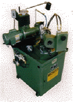 Rush Tool and Cutter Grinder.  For resharpening and making drills, end mills, counter bores and many other ID tools.