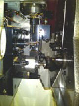 Escomatic CNC coil feed screw machine with live tools